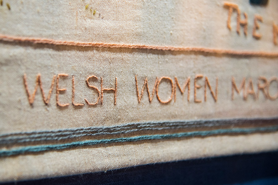 Tapestry wording "Welsh Women March".